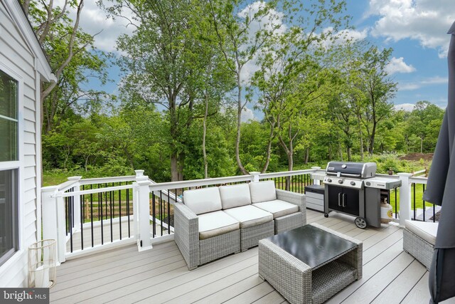 1051 Glen Hall Rd, Kennett Square, PA 19348 - wooden terrace with an outdoor hangout area, a grill, and view of wooded area