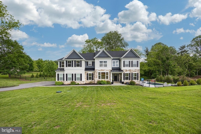 1051 Glen Hall Rd, Kennett Square, PA 19348 - multi unit property with stone siding, a standing seam roof, an outdoor pool, metal roof, and a patio