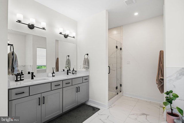 full bathroom with marble finish flooring, a stall shower, baseboards, double vanity, and recessed lighting