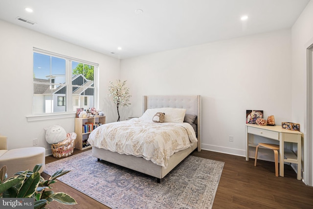 bedroom with dark wood-style floors, recessed lighting, and baseboards