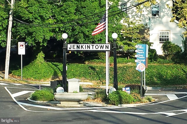 100 W Ave Unit 406S, Jenkintown, PA 19046 - view of asphalt road featuring street lights, curbs, and traffic signs