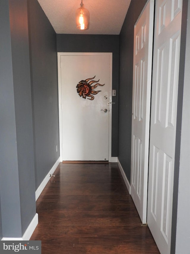 100 W Ave Unit 406S, Jenkintown, PA 19046 - hallway featuring baseboards and wood finished floors