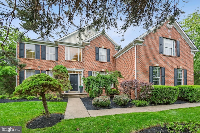 537 Tawnyberry Ln, Collegeville, PA 19426 - view of front of property with brick siding and a front lawn