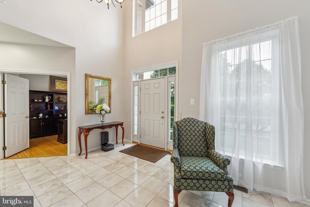 537 Tawnyberry Ln, Collegeville, PA 19426 - foyer entrance featuring a high ceiling, a chandelier, and baseboards