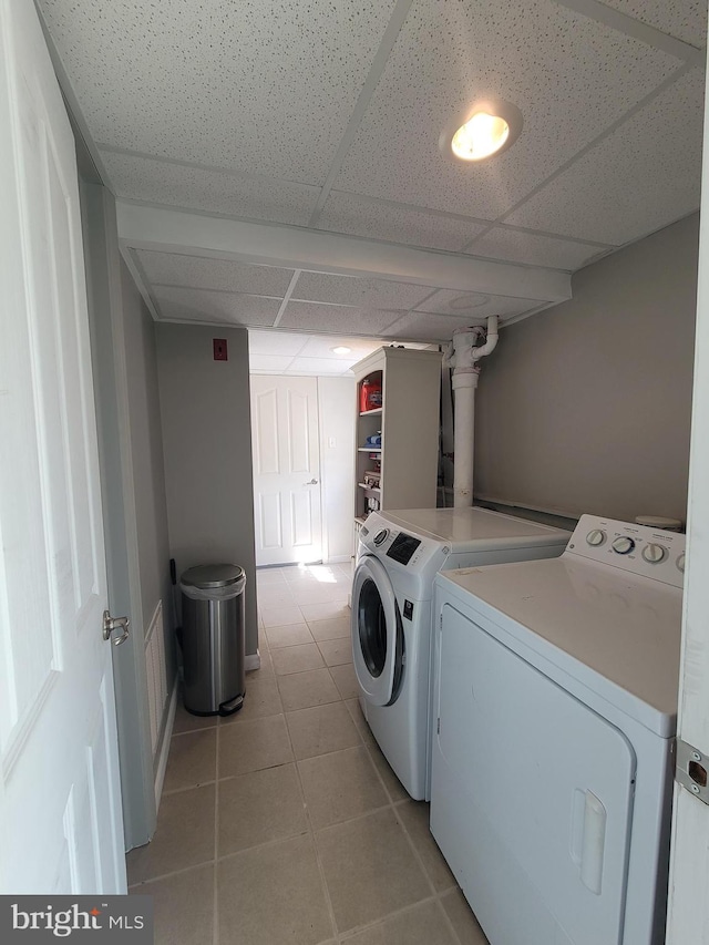 17 W Delaware Dr, Little Egg Harbor Twp, NJ 08087 - laundry room featuring washer and clothes dryer and light tile patterned floors