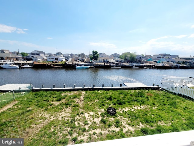 17 W Delaware Dr, Little Egg Harbor Twp, NJ 08087 - water view with nearby suburban area, a dock, and fence