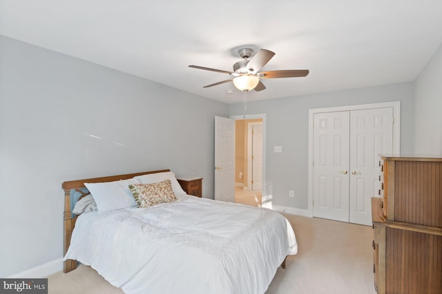 1490 Jakes Creek Dr, Woodbine, MD 21797 - bedroom featuring light carpet, a closet, baseboards, and a ceiling fan