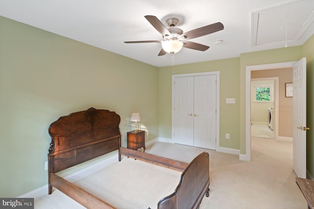 1490 Jakes Creek Dr, Woodbine, MD 21797 - bedroom with attic access, washer / dryer, light carpet, a closet, and baseboards