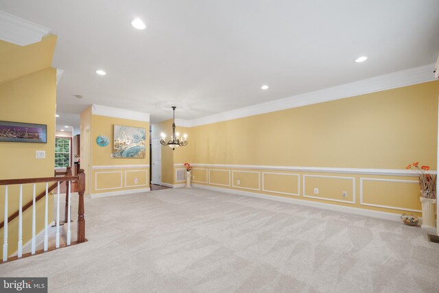 20390 Center Brook Square, Sterling, VA 20165 - unfurnished room with crown molding, a decorative wall, a chandelier, carpet floors, and a wainscoted wall