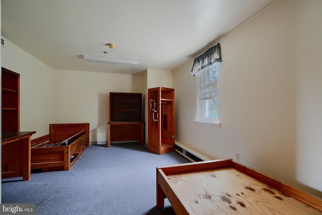 116 Callender St, Baltimore, MD 21201 - carpeted bedroom featuring a baseboard heating unit and baseboards