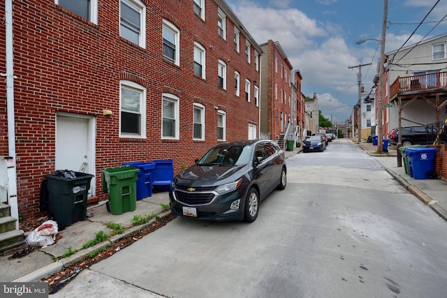 116 Callender St, Baltimore, MD 21201 - view of concrete road with street lighting, curbs, and sidewalks