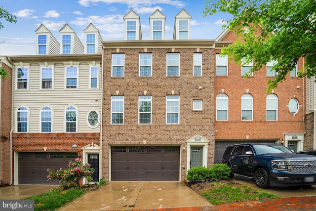 15604 Tibberton Ter, Upper Marlboro, MD 20774 - view of property with an attached garage, brick siding, and driveway
