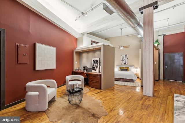 428 N 13th St Unit 3G, Philadelphia, PA 19123 - living area featuring a towering ceiling, light wood-style flooring, ceiling fan, and electric panel