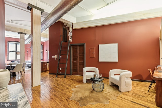 428 N 13th St Unit 3G, Philadelphia, PA 19123 - sitting room featuring ornate columns, hardwood / wood-style floors, and a high ceiling