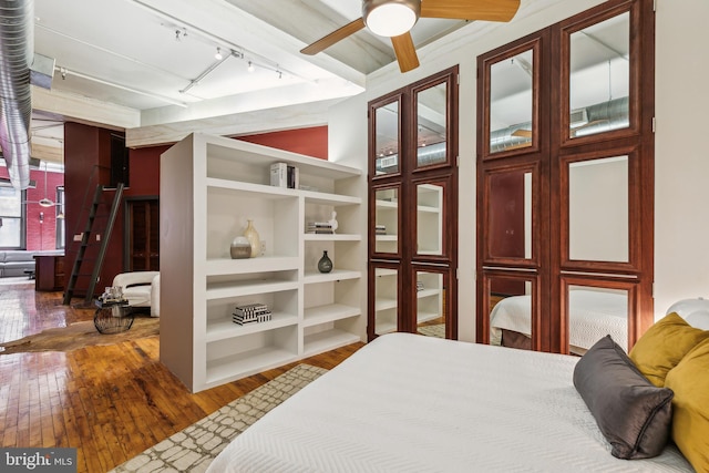 428 N 13th St Unit 3G, Philadelphia, PA 19123 - bedroom featuring track lighting and hardwood / wood-style flooring