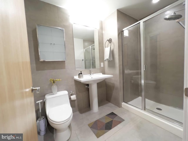 1133 14th St NW Unit 1005, Washington, DC 20005 - full bathroom with toilet, a stall shower, and tile patterned flooring