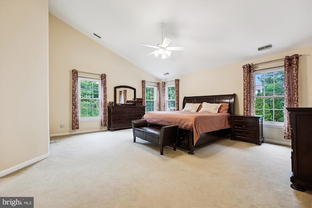 bedroom with baseboards, light colored carpet, a ceiling fan, and high vaulted ceiling