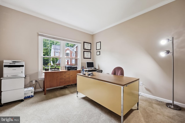 office area with light carpet, ornamental molding, and baseboards