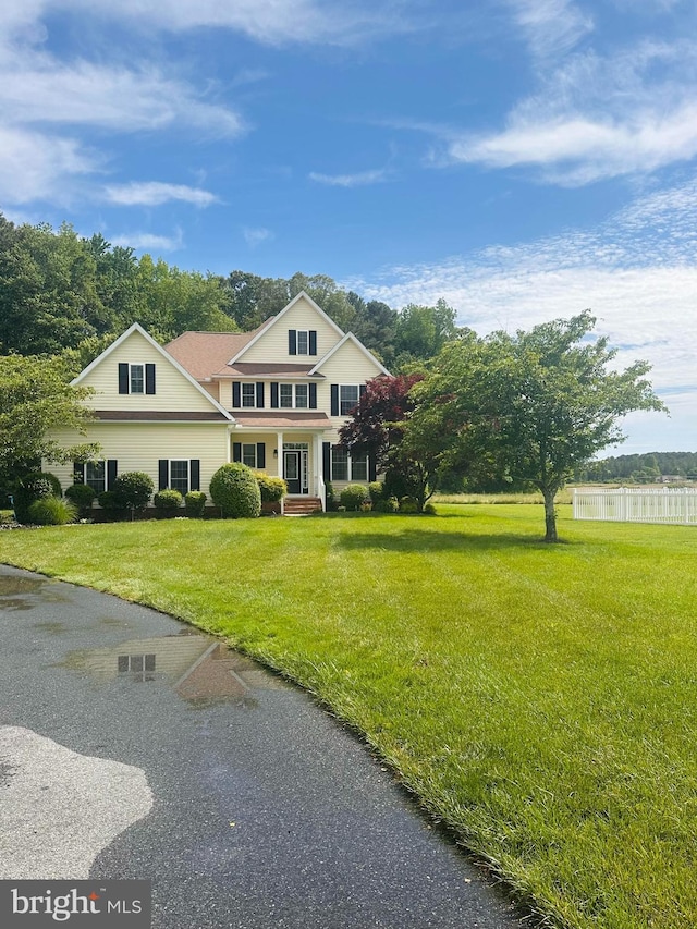 26161 Bosch Ln, Hebron, MD 21830 - traditional home with a front lawn and covered porch