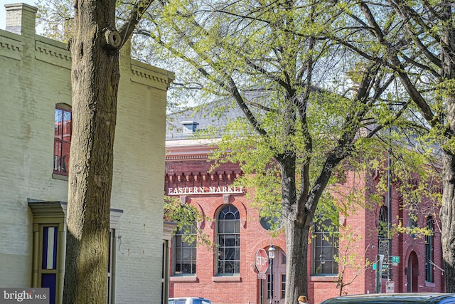 view of front of home with brick siding