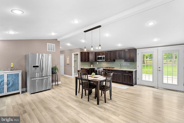 83 Ridge Crest Dr, Harpers Ferry, WV 25425 - dining space with lofted ceiling, light wood-style floors, baseboards, and recessed lighting