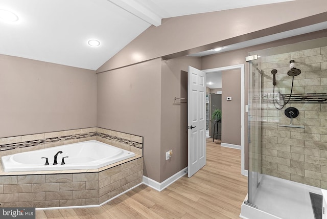 83 Ridge Crest Dr, Harpers Ferry, WV 25425 - full bathroom with a stall shower, a garden tub, wood finished floors, and baseboards