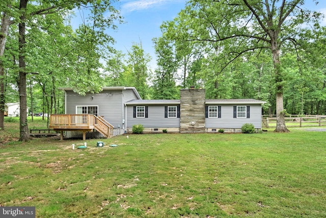 83 Ridge Crest Dr, Harpers Ferry, WV 25425 - rear view of property with a wooden deck and a chimney