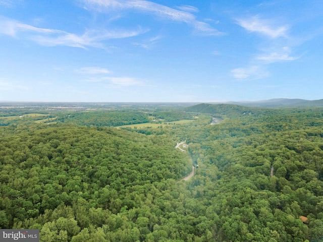 83 Ridge Crest Dr, Harpers Ferry, WV 25425 - drone / aerial view of a heavily wooded area and a mountain backdrop