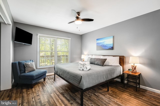 392 Passage Ln, Mc Gaheysville, VA 22840 - bedroom featuring baseboards, wood finished floors, and a ceiling fan
