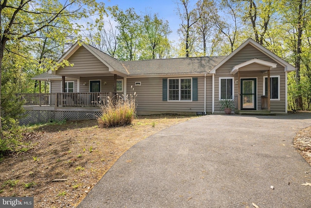392 Passage Ln, Mc Gaheysville, VA 22840 - view of front of home with a porch, asphalt driveway, and a shingled roof