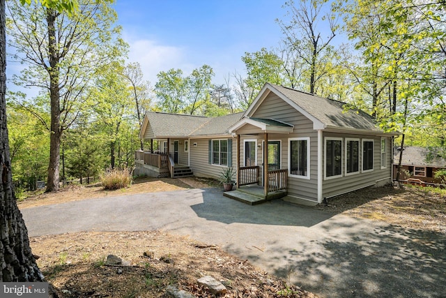 392 Passage Ln, Mc Gaheysville, VA 22840 - view of front of property featuring a shingled roof and asphalt driveway