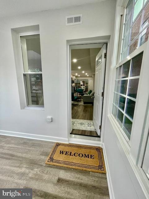 263 S Hilton St, Baltimore, MD 21229 - view of exterior entry featuring stucco siding