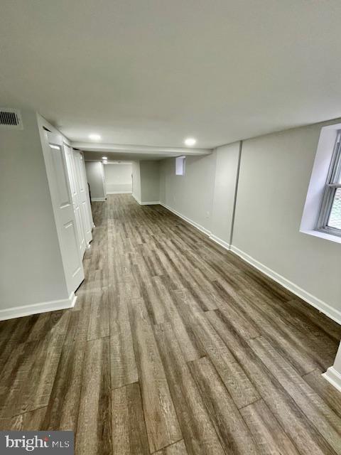 263 S Hilton St, Baltimore, MD 21229 - basement with wood finished floors, baseboards, and recessed lighting