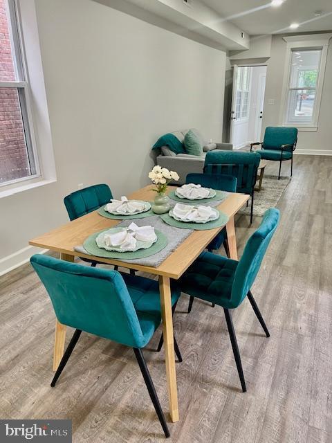 263 S Hilton St, Baltimore, MD 21229 - dining room with wood finished floors and baseboards