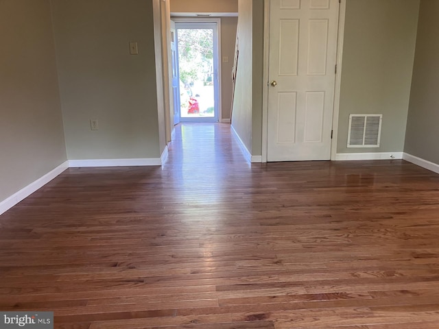 9118 Bobwhite Cir, Gaithersburg, MD 20879 - empty room with wood finished floors and baseboards
