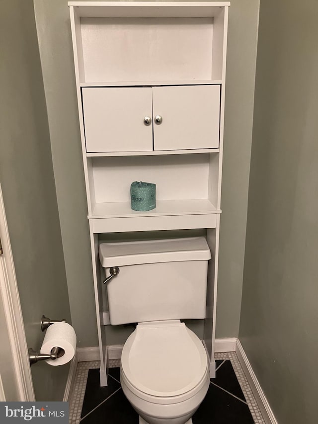 9118 Bobwhite Cir, Gaithersburg, MD 20879 - bathroom featuring tile patterned floors, baseboards, and toilet