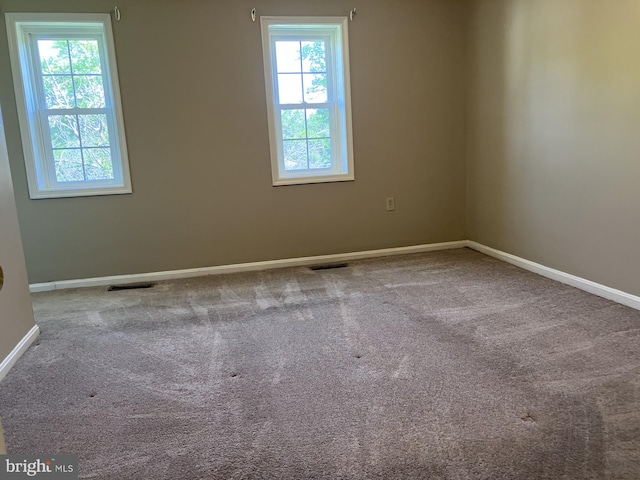 9118 Bobwhite Cir, Gaithersburg, MD 20879 - spare room featuring baseboards and carpet