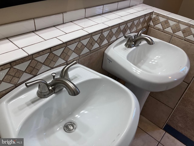 9118 Bobwhite Cir, Gaithersburg, MD 20879 - bathroom view of a sink and tile walls