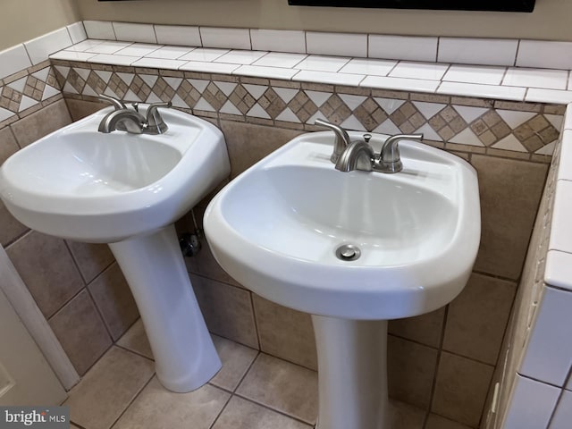 9118 Bobwhite Cir, Gaithersburg, MD 20879 - bathroom with tile walls and a sink