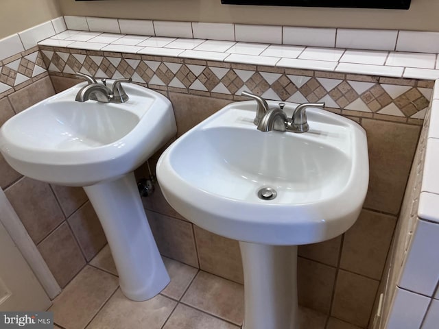 9118 Bobwhite Cir, Gaithersburg, MD 20879 - bathroom with tile walls and a sink