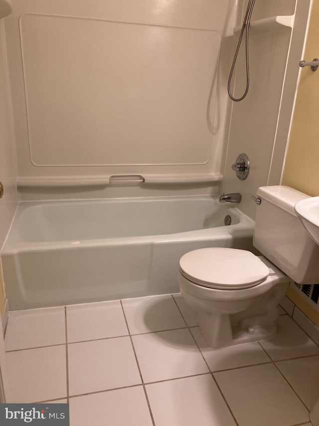 9118 Bobwhite Cir, Gaithersburg, MD 20879 - bathroom featuring tile patterned flooring, shower / washtub combination, and toilet