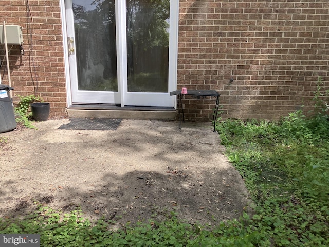 9118 Bobwhite Cir, Gaithersburg, MD 20879 - view of exterior entry featuring brick siding