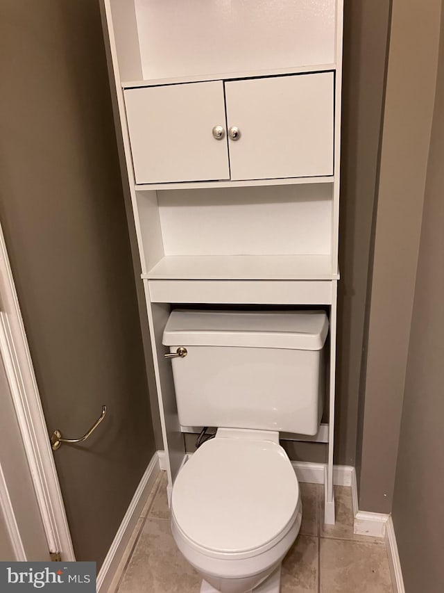 9118 Bobwhite Cir, Gaithersburg, MD 20879 - bathroom featuring baseboards, toilet, and tile patterned flooring