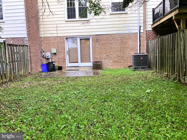 9118 Bobwhite Cir, Gaithersburg, MD 20879 - back of property featuring central AC and brick siding