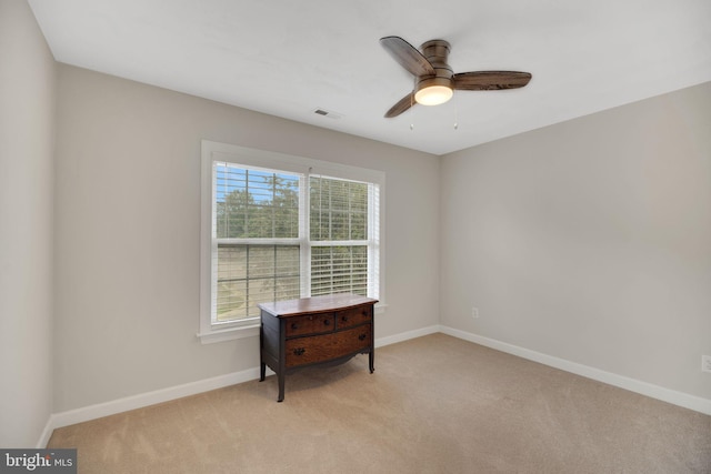 219 N Benjamin Howell St, Williamsburg, VA 23188 - empty room with light colored carpet, baseboards, and a ceiling fan