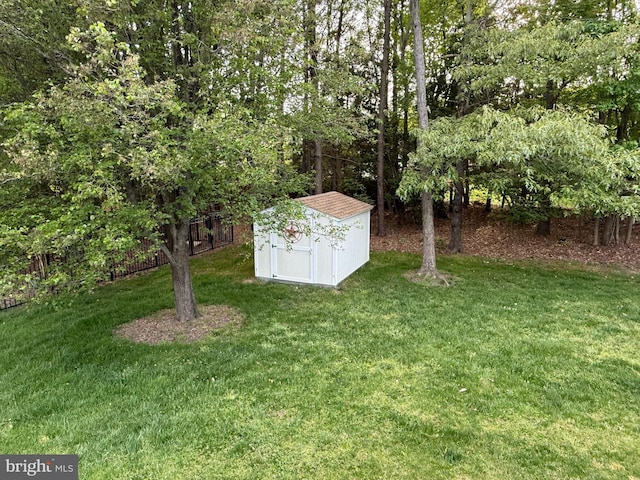 219 N Benjamin Howell St, Williamsburg, VA 23188 - view of yard with a storage shed and an outdoor structure