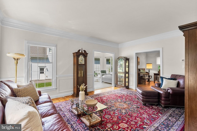 301 Reserve Gate Ter, Silver Spring, MD 20905 - living room featuring ornamental molding, healthy amount of natural light, and a wainscoted wall