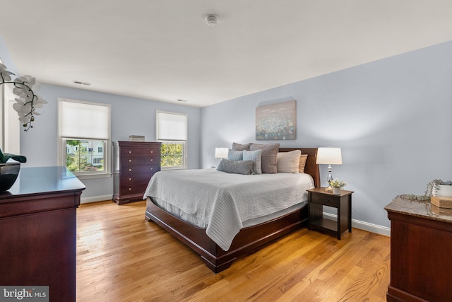 301 Reserve Gate Ter, Silver Spring, MD 20905 - bedroom featuring light wood-style flooring and baseboards