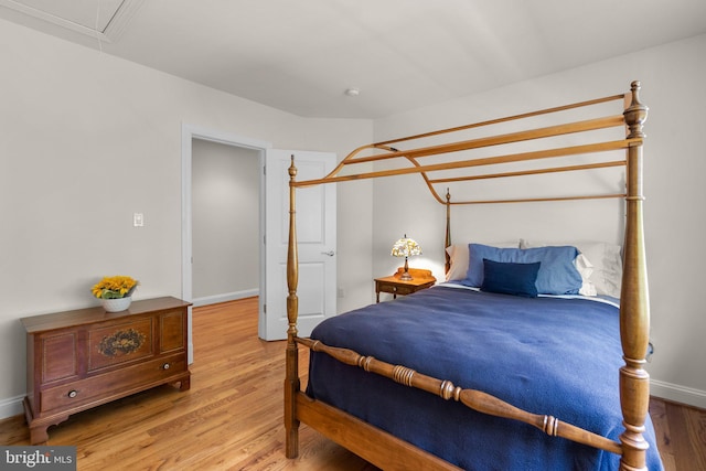 301 Reserve Gate Ter, Silver Spring, MD 20905 - bedroom with light wood-style flooring, attic access, and baseboards