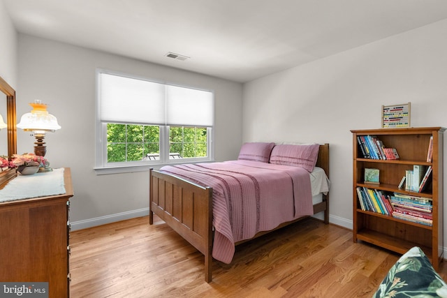 301 Reserve Gate Ter, Silver Spring, MD 20905 - bedroom with light wood-type flooring and baseboards